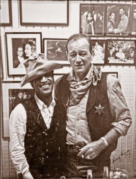 Filmed during the Civil Rights movement, Sergeants 3 became a significant Western for that era because Sammy Davis Jr. was cast as a comic equal...wearing John Wayne’s iconic cavalry hat nonetheless! Heritage Auctions sold this photo of the two friends at its John Wayne auction in 2011.– Courtesy Heritage Auctions –