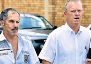 Martin Stevens, left, arrives at Mount Road police station with his attorney Dean Murray. Picture: MIKE HOLMES